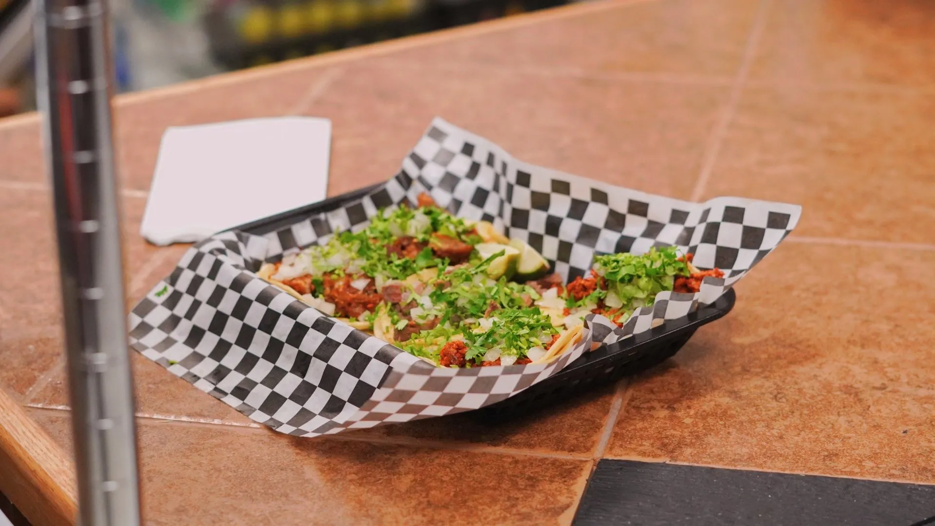 Fresh Mexican tacos topped with meat, cilantro, onions and lime at Taqueria Market Portland